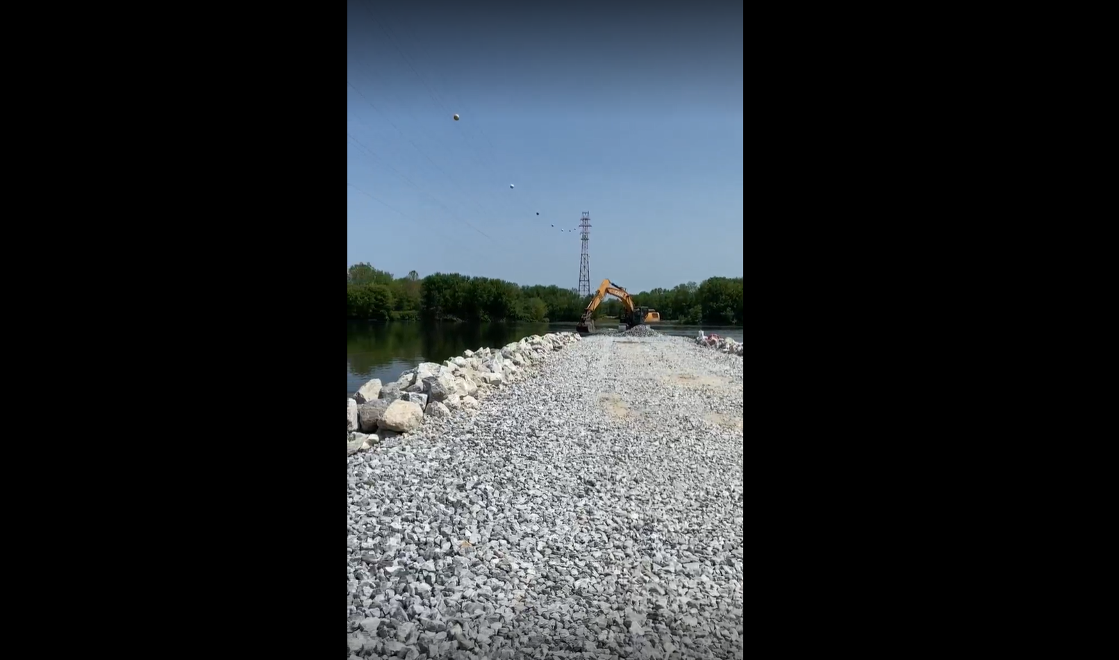 PPL Electric Utilities - Stone Causeway Construction B-Roll - Payloader and River (9 Seconds)